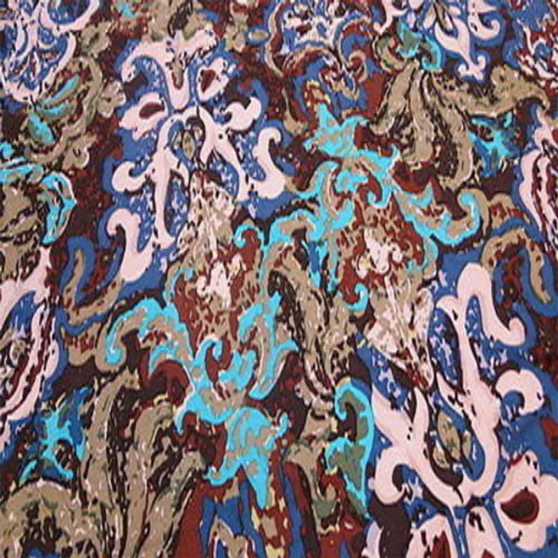 100% Rayon Beautiful Distorted Flowers With Hues Of Blue, Fuchsia, Green And White Tones 58-60 Inches Wide