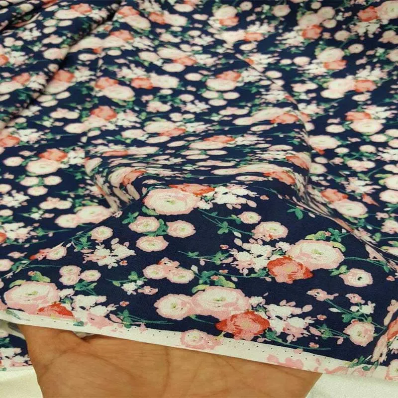 100% Rayon Challis With Pink Small Flowers Print On Navy Blue Background Fabric