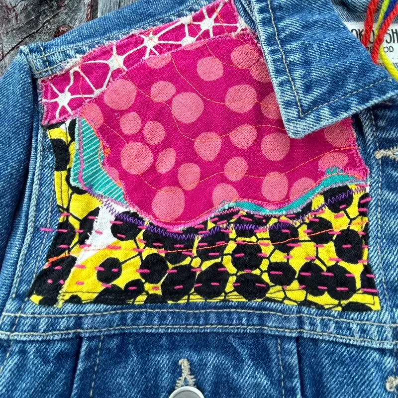 Quilt and Denim Jacket with floral appliques